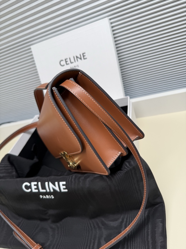 The TEEN-sized handbag from the CELINE Triomphe series (commonly known as the "baguette bag") has been a very popular commuter style for the brand in recent years.
