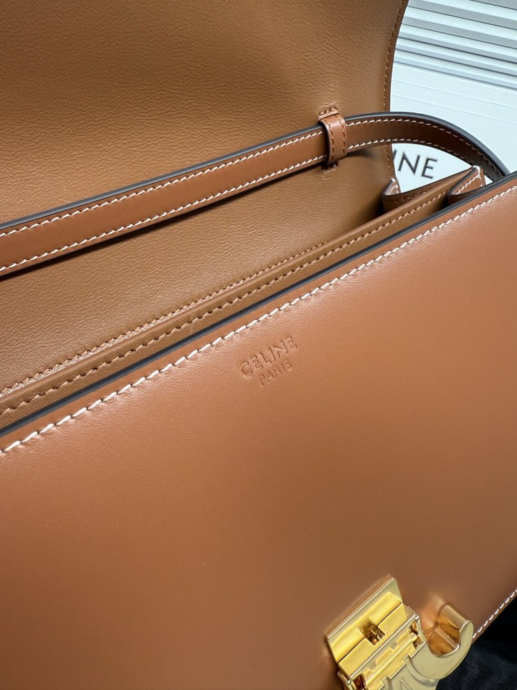 The TEEN-sized handbag from the CELINE Triomphe series (commonly known as the "baguette bag") has been a very popular commuter style for the brand in recent years.