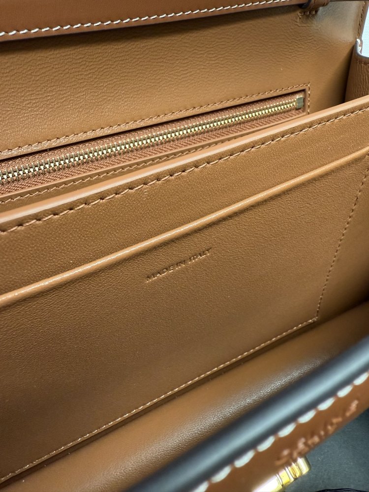 The TEEN-sized handbag from the CELINE Triomphe series (commonly known as the "baguette bag") has been a very popular commuter style for the brand in recent years.