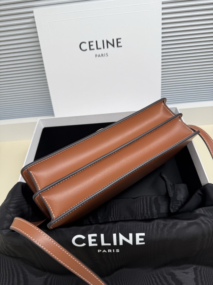 The TEEN-sized handbag from the CELINE Triomphe series (commonly known as the "baguette bag") has been a very popular commuter style for the brand in recent years.