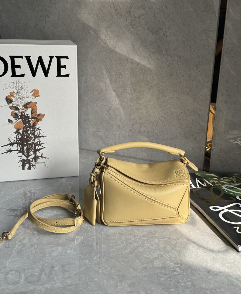 The LOEWE Puzzle Mini geometric bag—often referred to as the "Puzzle Bag"—is one of LOEWE's most classic and iconic styles.