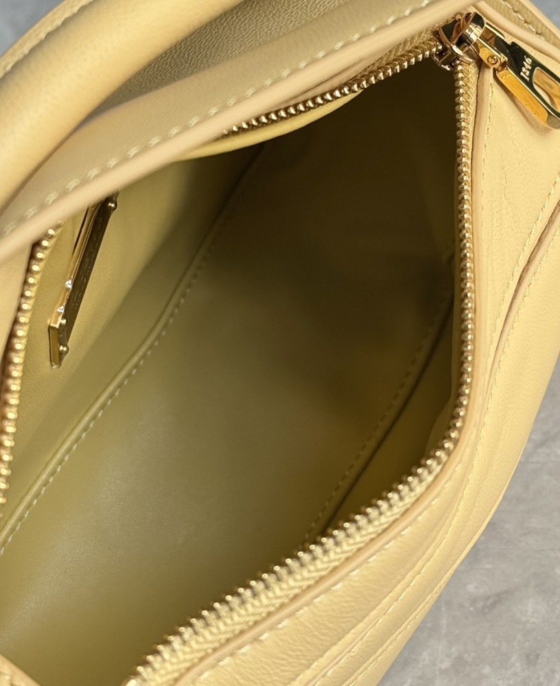 The LOEWE Puzzle Mini geometric bag—often referred to as the "Puzzle Bag"—is one of LOEWE's most classic and iconic styles.