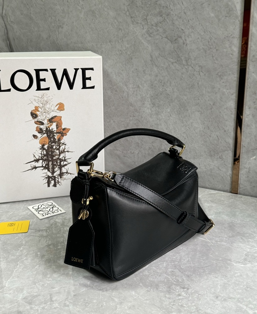 The LOEWE Puzzle Small geometric patchwork handbag—often referred to as the "Puzzle Bag" series—is one of the brand's iconic classics.