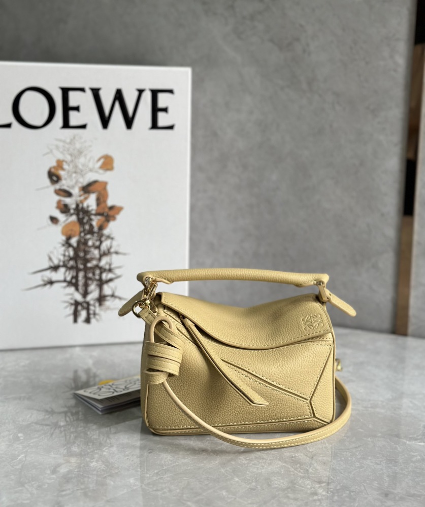 The LOEWE Puzzle Mini bag in soft grained calfskin—the miniature version of the "Puzzle Bag" series, as it is commonly known.