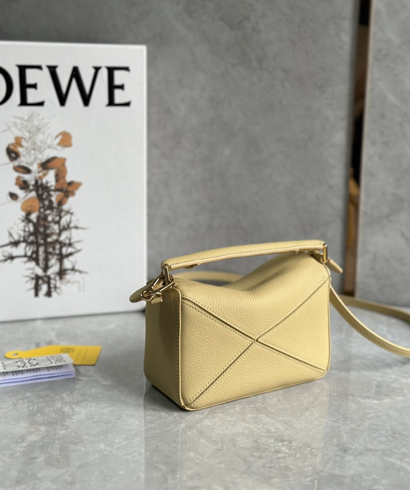 The LOEWE Puzzle Mini bag in soft grained calfskin—the miniature version of the "Puzzle Bag" series, as it is commonly known.