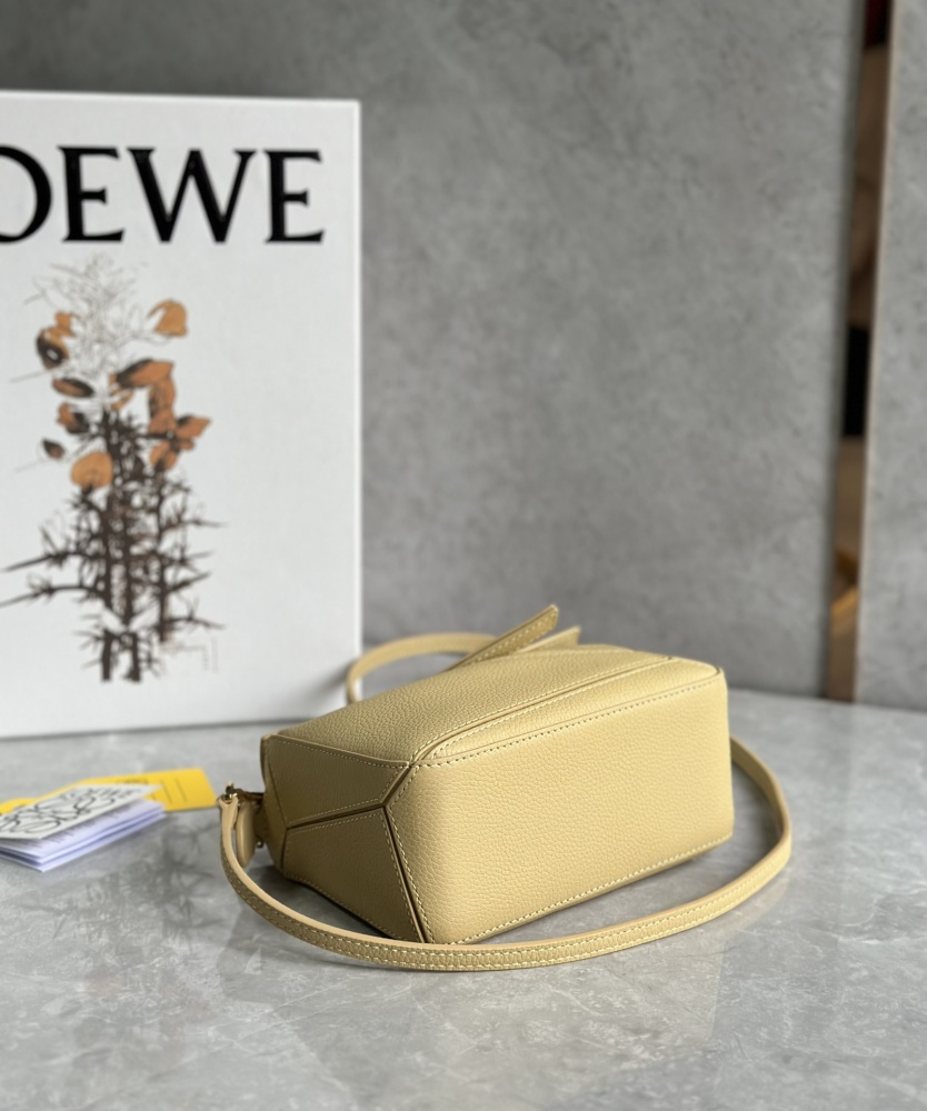The LOEWE Puzzle Mini bag in soft grained calfskin—the miniature version of the "Puzzle Bag" series, as it is commonly known.