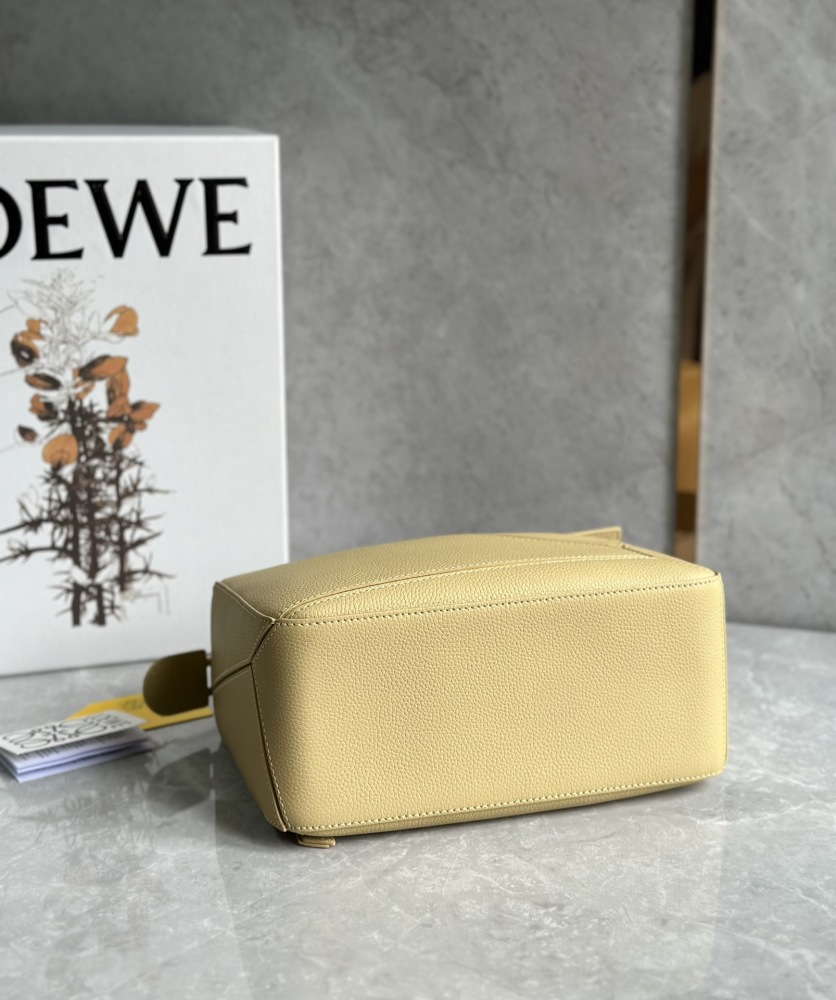 The LOEWE Puzzle Mini bag in soft grained calfskin—the miniature version of the "Puzzle Bag" series, as it is commonly known.