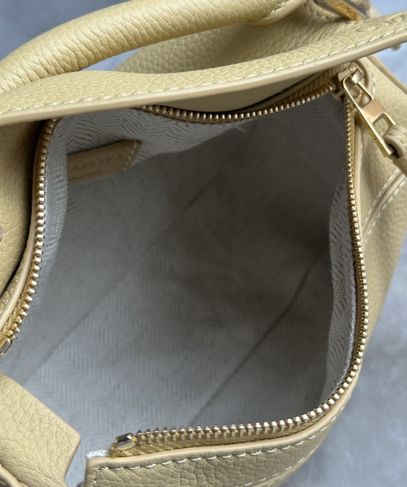 The LOEWE Puzzle Mini bag in soft grained calfskin—the miniature version of the "Puzzle Bag" series, as it is commonly known.