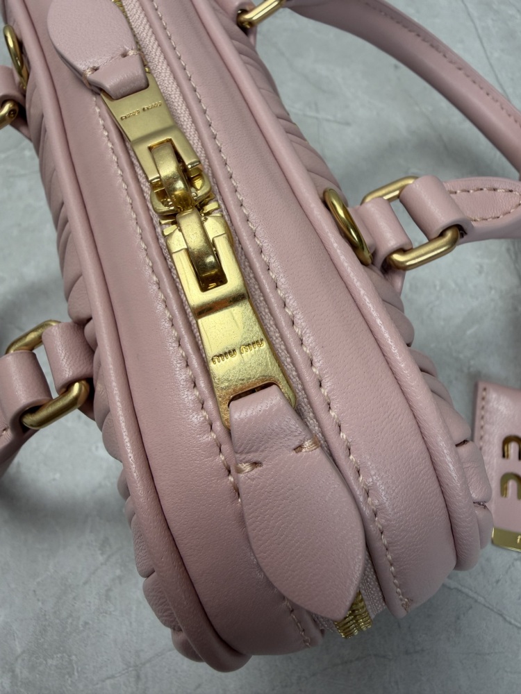The Miu Miu Matelassé mini bowling bag is a popular sweet and girly item from the brand in recent years.