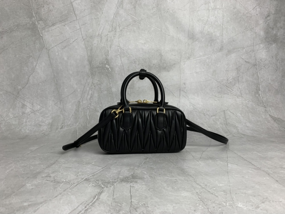 The Miu Miu Matelassé mini bowling bag (black) is a highly popular and trending item from the brand in recent years.