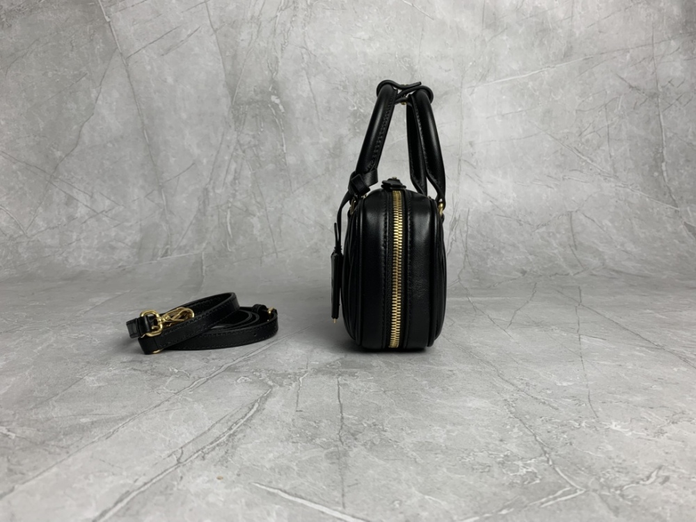 The Miu Miu Matelassé mini bowling bag (black) is a highly popular and trending item from the brand in recent years.