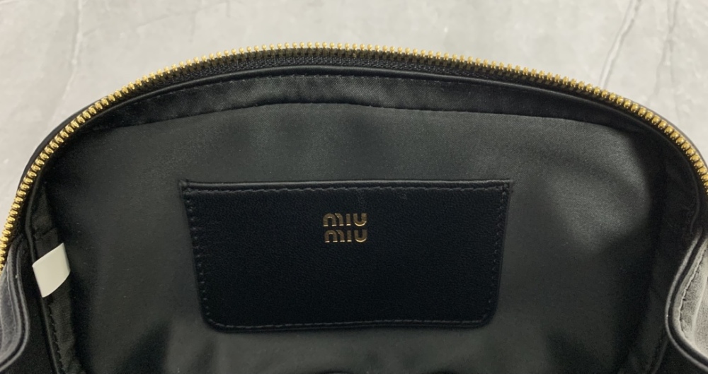The Miu Miu Matelassé mini bowling bag (black) is a highly popular and trending item from the brand in recent years.