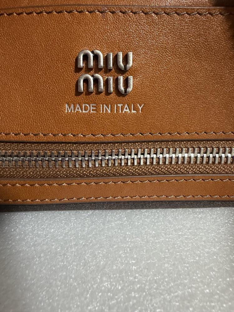 The Miu Miu vintage bowling tote bag is a popular vintage-style work bag in recent years.