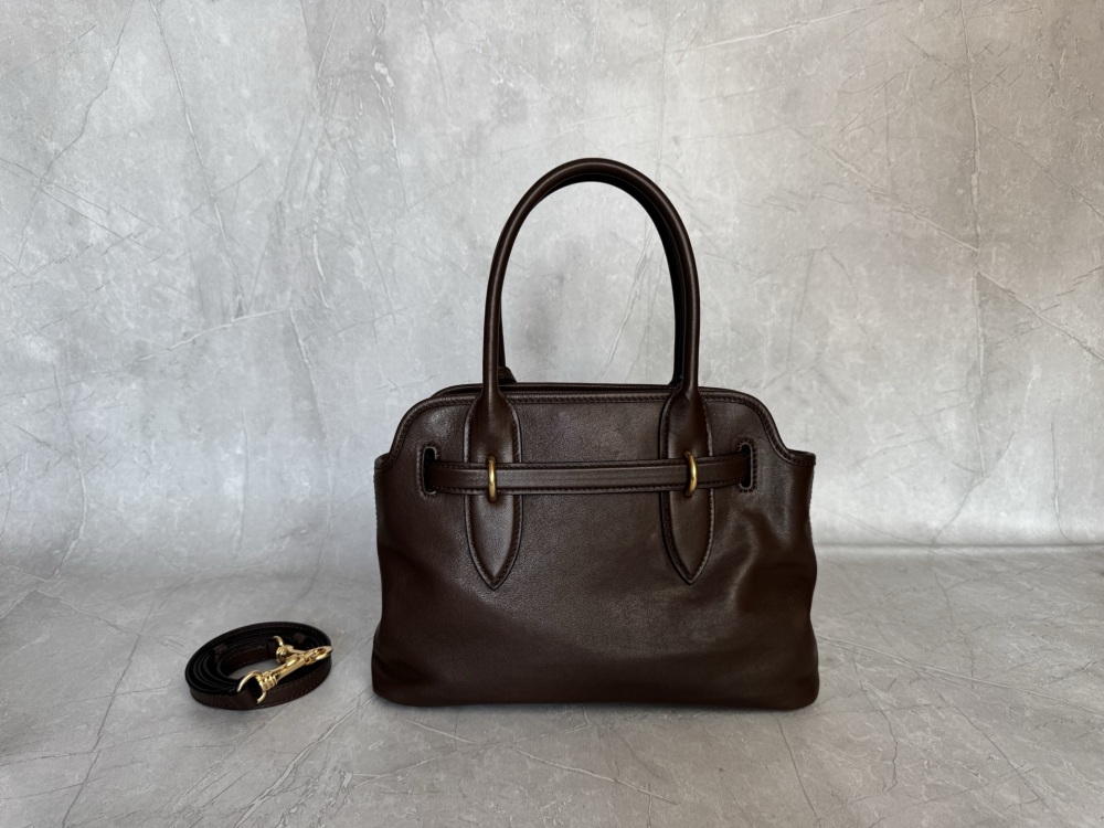 The Miu Miu Aventure medium-sized tote bag (dark brown calfskin) is a highly popular retro-style work bag in recent years.