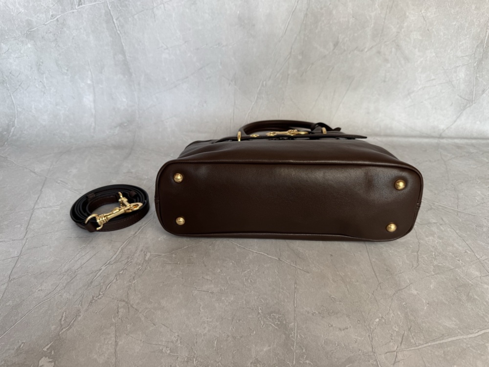 The Miu Miu Aventure medium-sized tote bag (dark brown calfskin) is a highly popular retro-style work bag in recent years.