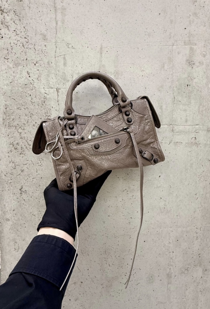 The Balenciaga Classic City Mini Motorcycle Bag is a mini version of the brand's classic motorcycle bag.