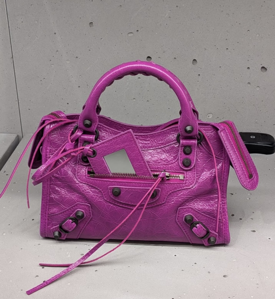 The Balenciaga Classic City Mini Motorcycle Bag is a mini version of the brand's classic motorcycle bag.