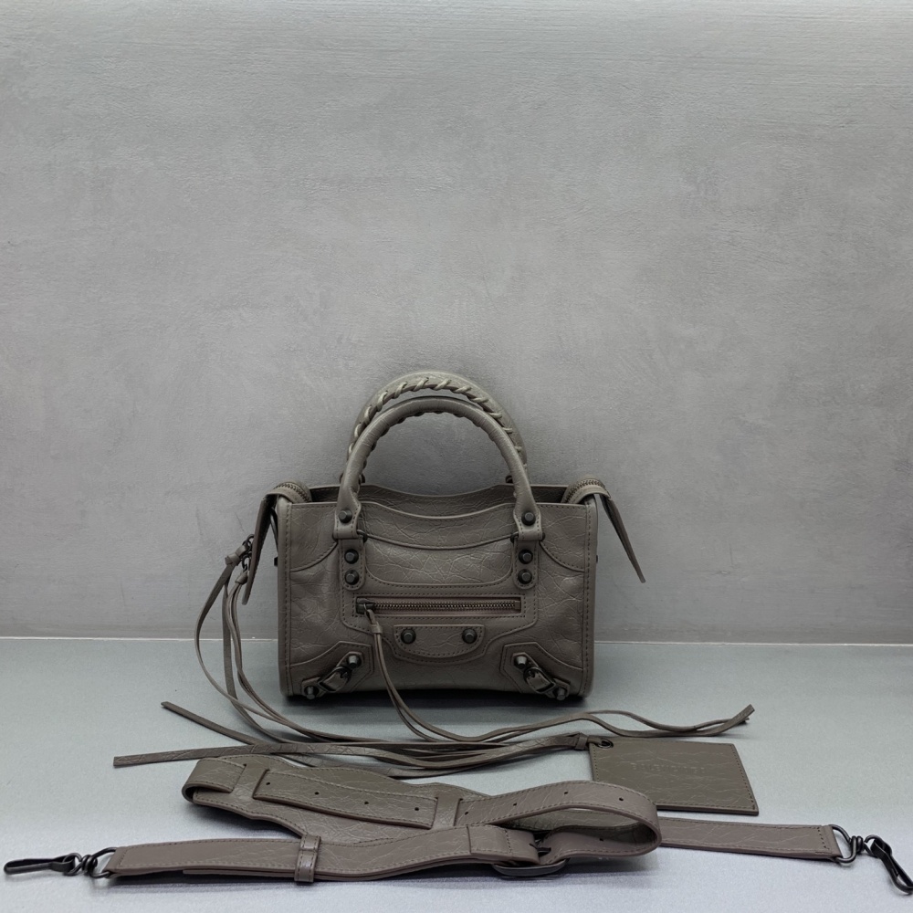 The Balenciaga Classic City Mini Motorbike Bag (Elephant Grey) is a mini version of the brand's classic motorcycle bag.