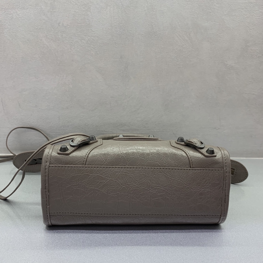 The Balenciaga Classic City Mini Motorbike Bag (Elephant Grey) is a mini version of the brand's classic motorcycle bag.