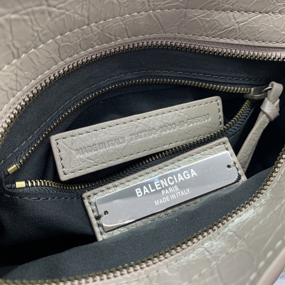 The Balenciaga Classic City Mini Motorbike Bag (Elephant Grey) is a mini version of the brand's classic motorcycle bag.