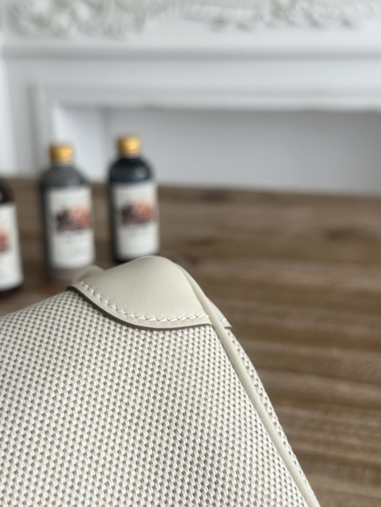 The classic Hermès Birkin bag, specifically the Birkin 25 canvas and leather version, is a popular Hermès "patchwork/canvas and leather" version.