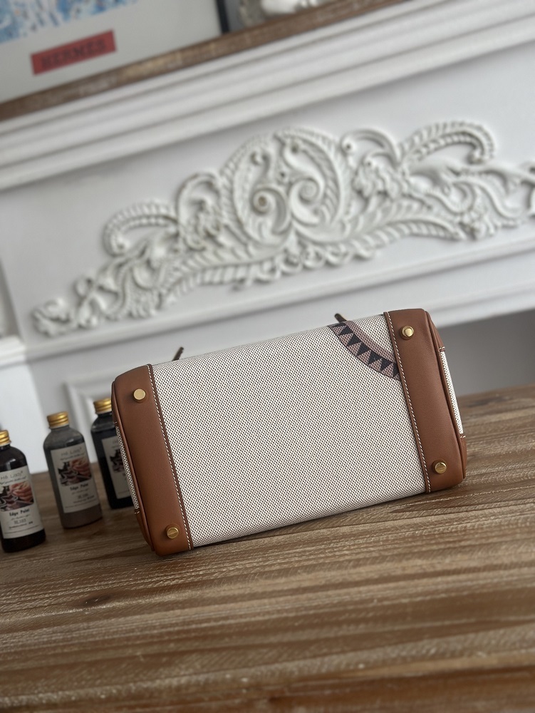 The limited/special edition Hermès Birkin bag, specifically the **"Horse Totem" canvas and calfskin Birkin**, is a highly distinctive version from Hermès.