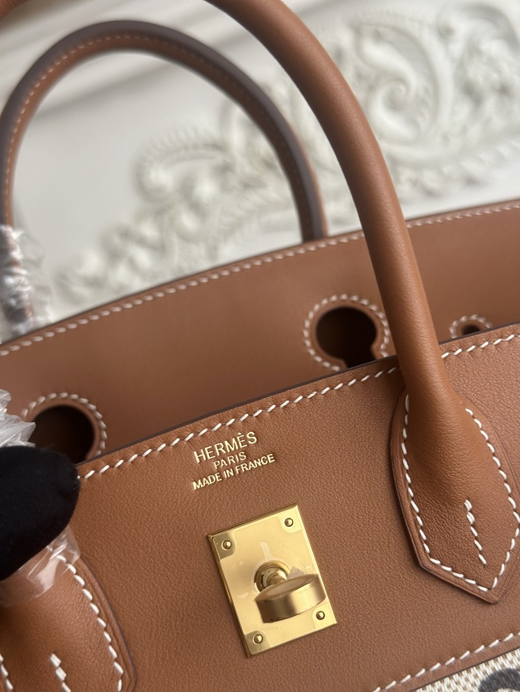 The limited/special edition Hermès Birkin bag, specifically the **"Horse Totem" canvas and calfskin Birkin**, is a highly distinctive version from Hermès.