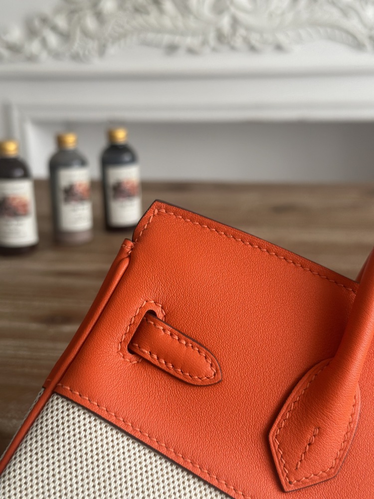 This canvas and leather tote bag, designed based on the Hermès Birkin bag, is also from the same series as your previous two bags.