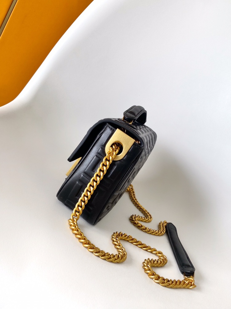 The Fendi classic Baguette bag (embossed with the FF logo) is the brand's iconic retro underarm bag.