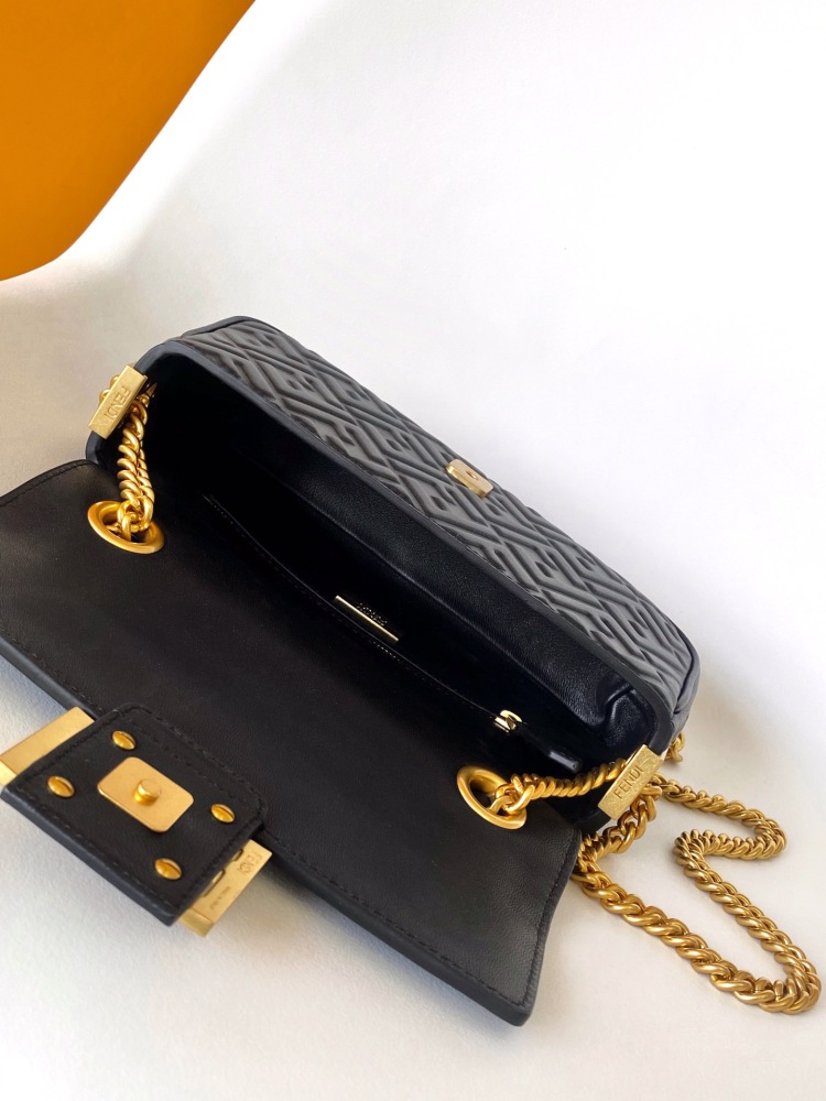 The Fendi classic Baguette bag (embossed with the FF logo) is the brand's iconic retro underarm bag.