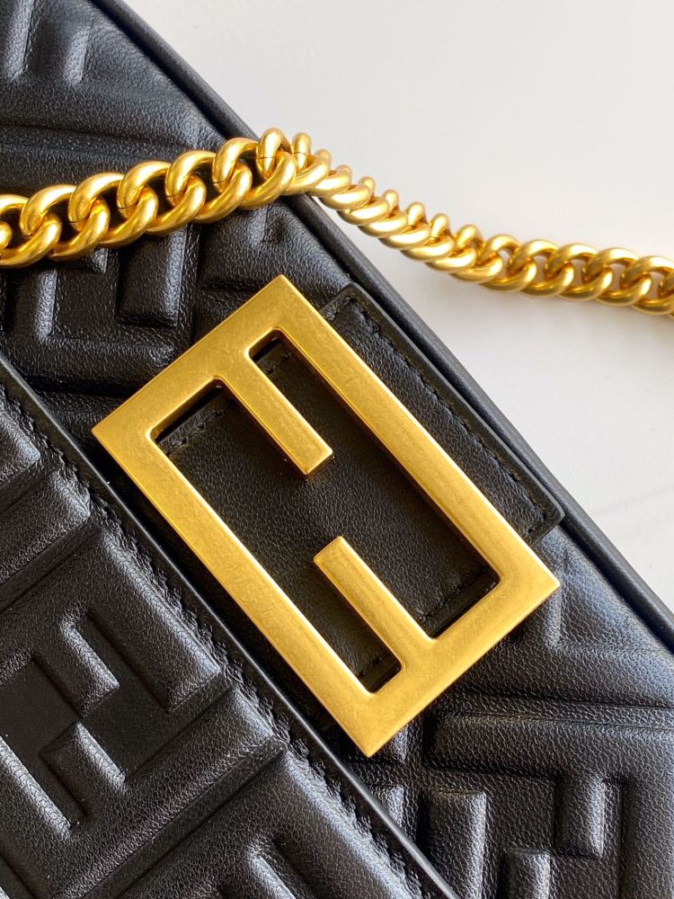 The Fendi classic Baguette bag (embossed with the FF logo) is the brand's iconic retro underarm bag.