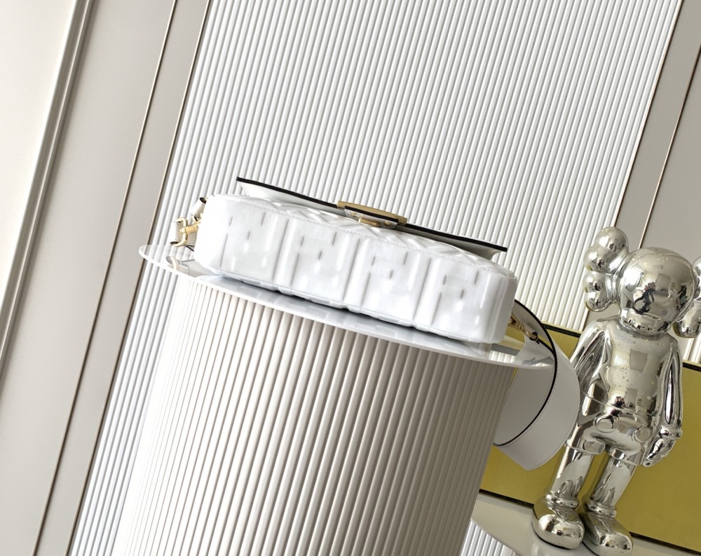 The Fendi classic Baguette bag (white with embossed FF logo) is the brand's iconic retro underarm bag.