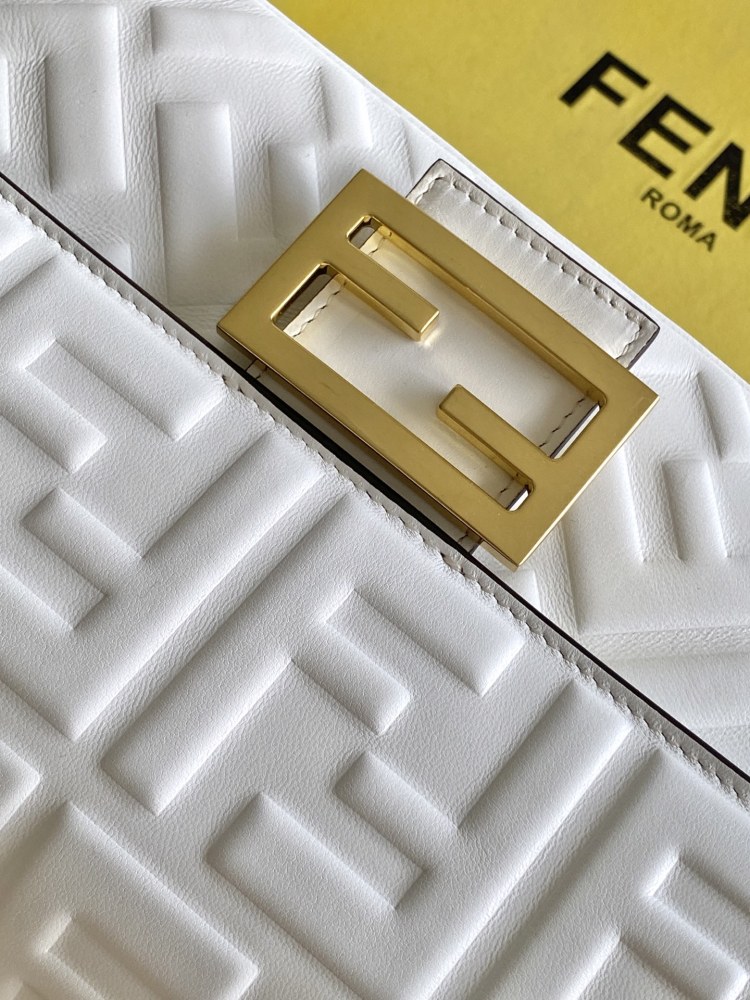 The Fendi classic Baguette bag (white with embossed FF logo) is the brand's iconic retro underarm bag.