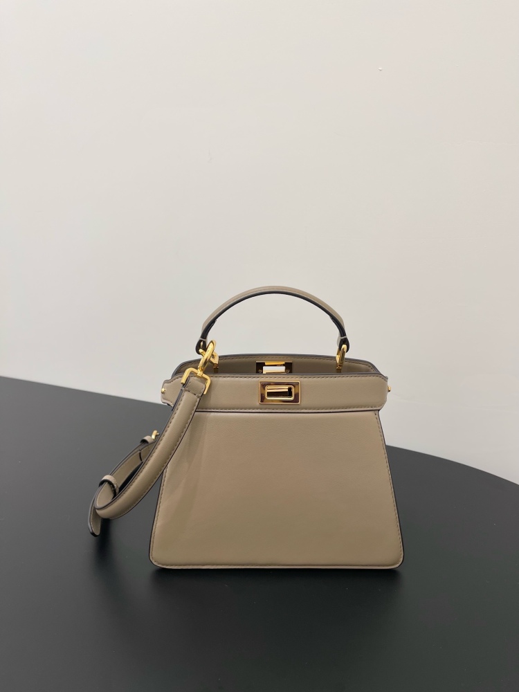 The Fendi Peekaboo mini handbag (elephant grey) is the brand's iconic "little monster" bag.