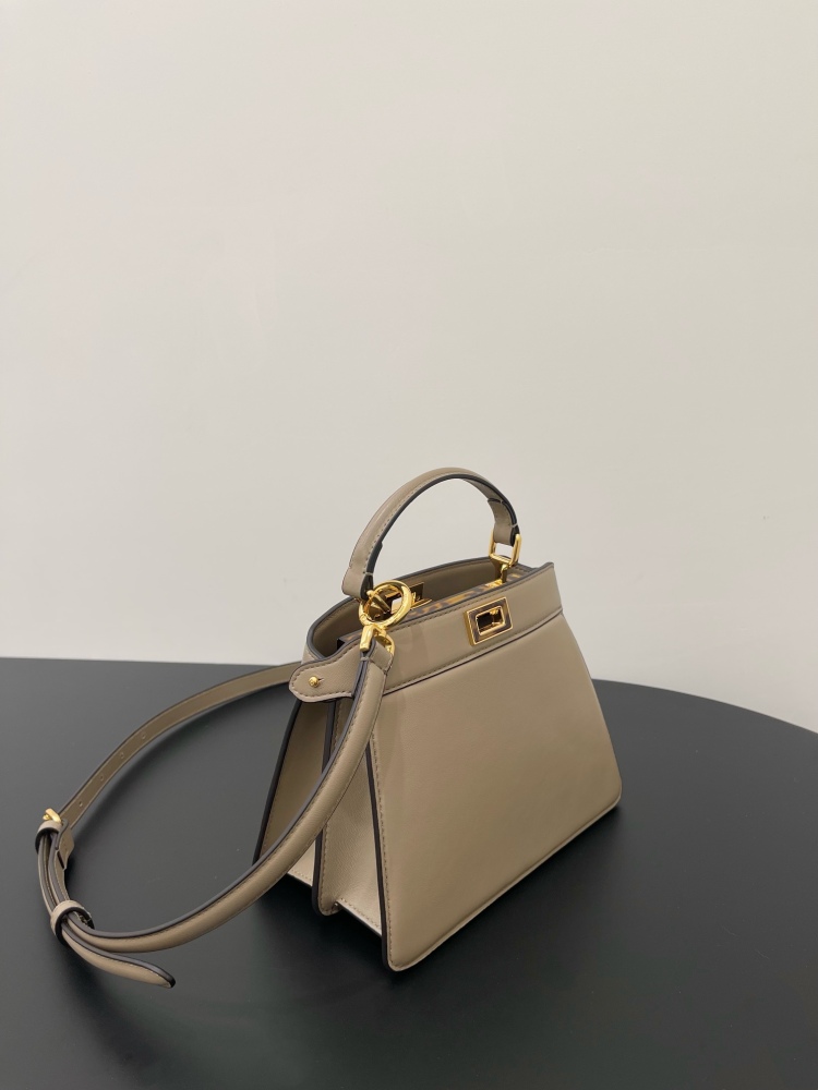 The Fendi Peekaboo mini handbag (elephant grey) is the brand's iconic "little monster" bag.
