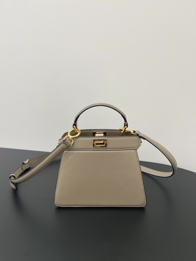 The Fendi Peekaboo mini handbag (elephant grey) is the brand's iconic "little monster" bag.