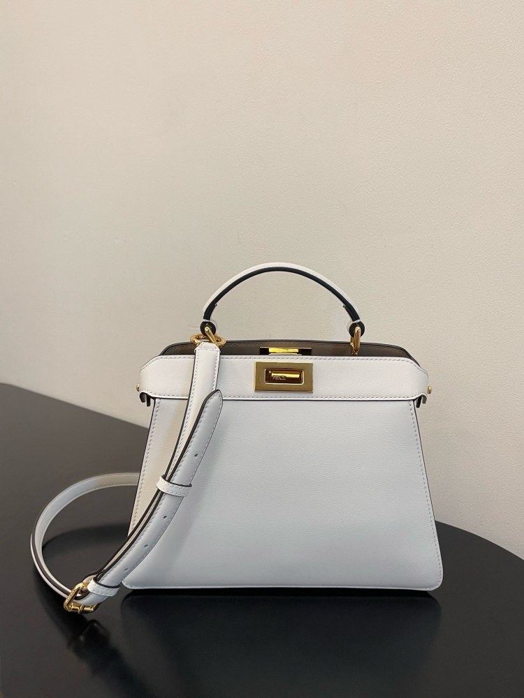 The Fendi Peekaboo mini handbag (off-white) is the brand's iconic "little monster" bag.