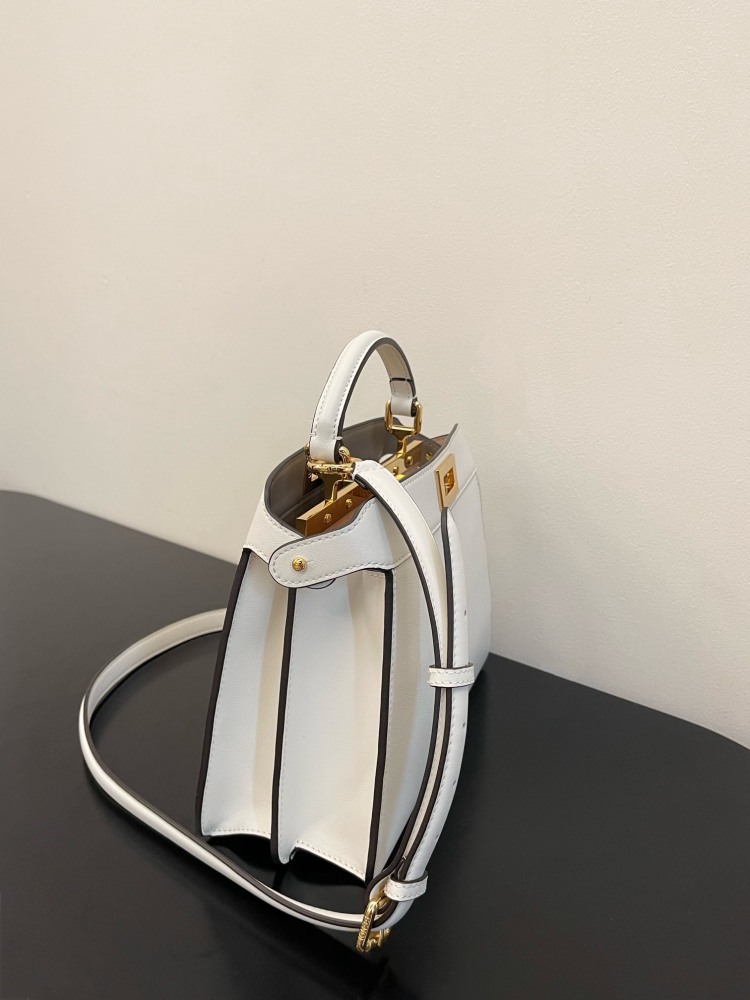 The Fendi Peekaboo mini handbag (off-white) is the brand's iconic "little monster" bag.