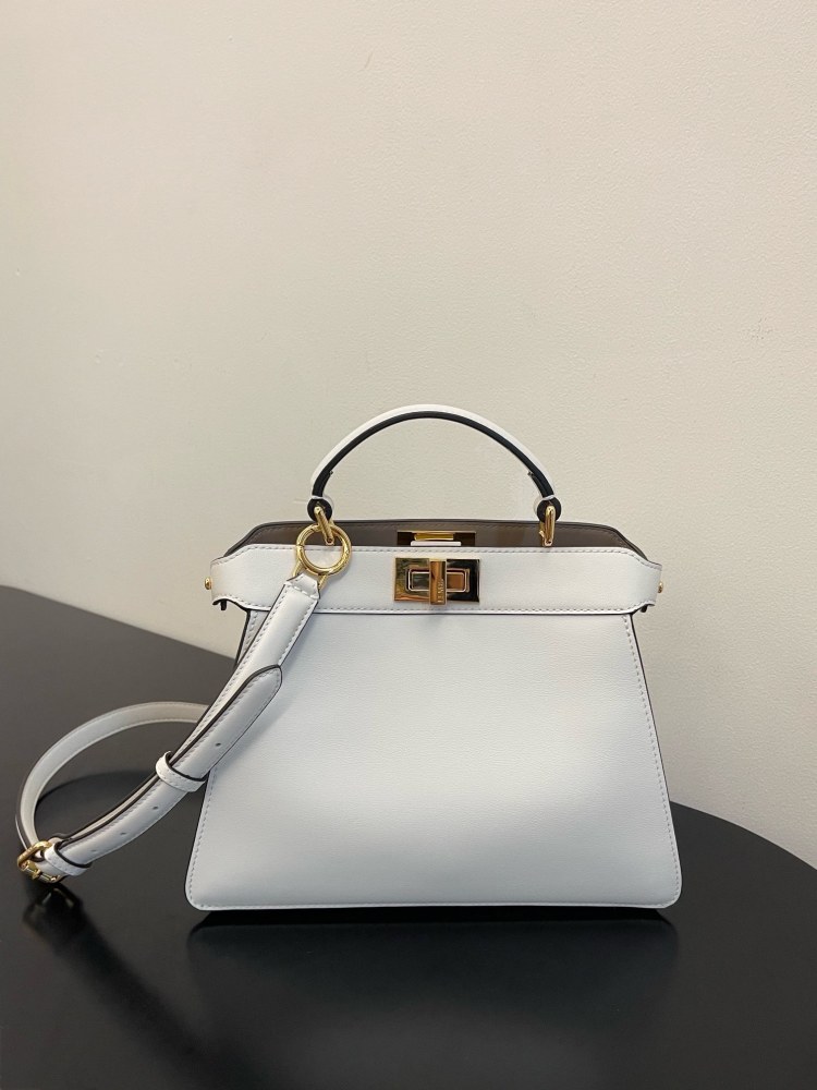 The Fendi Peekaboo mini handbag (off-white) is the brand's iconic "little monster" bag.