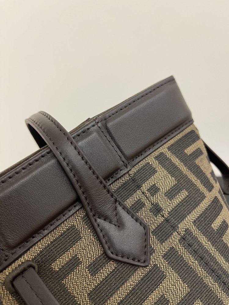 The Fendi Roll mini tote bag (FF monogram version) is a super popular "mini bucket" commuter bag from the brand in recent years.