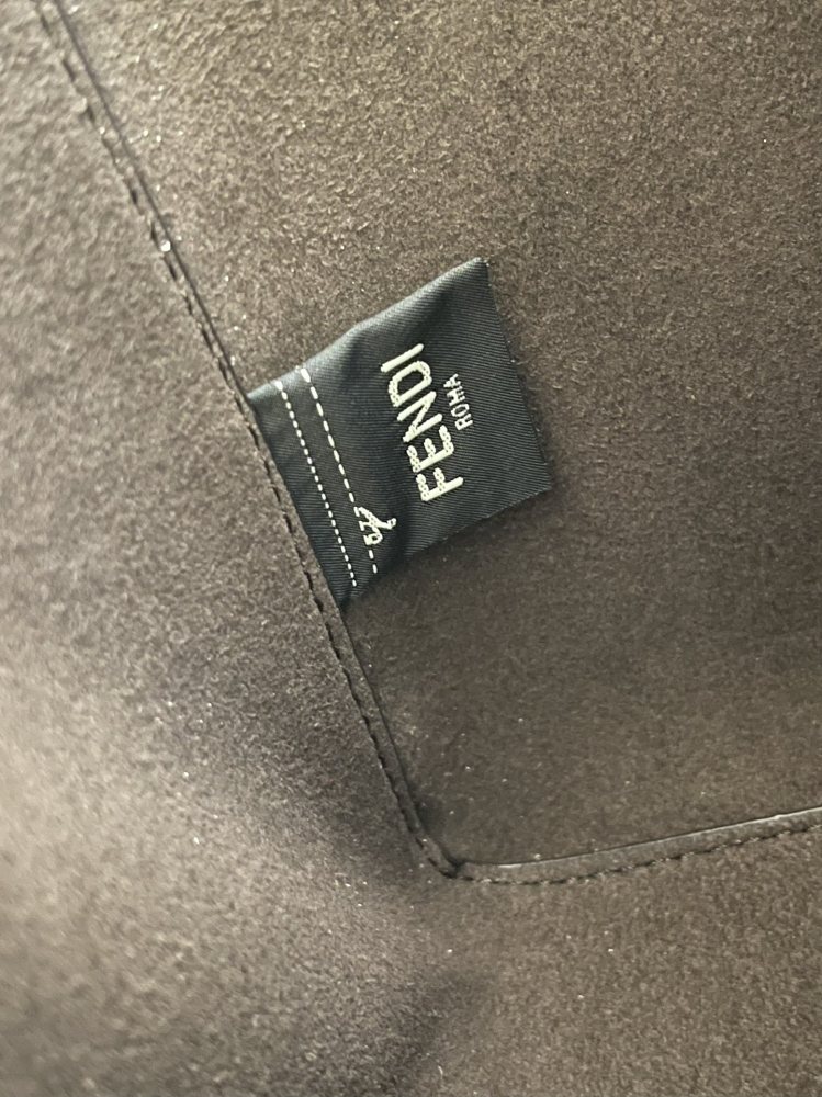 The Fendi Roll mini tote bag (FF monogram version) is a super popular "mini bucket" commuter bag from the brand in recent years.