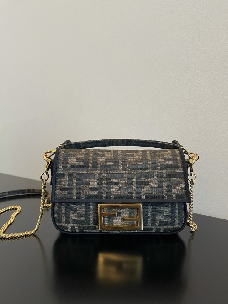 The Fendi classic Baguette bag (FF monogram mini version) is the brand's iconic retro underarm bag.