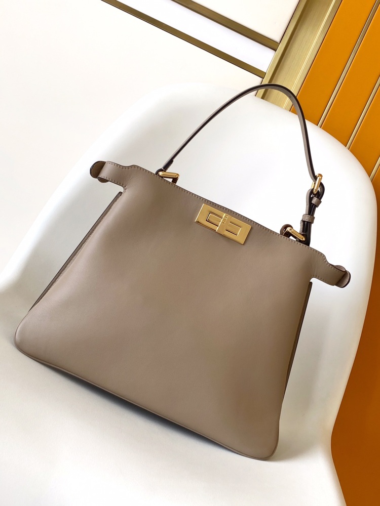 The Fendi Peekaboo medium-sized handbag (elephant grey) is the brand's iconic "little monster" bag.