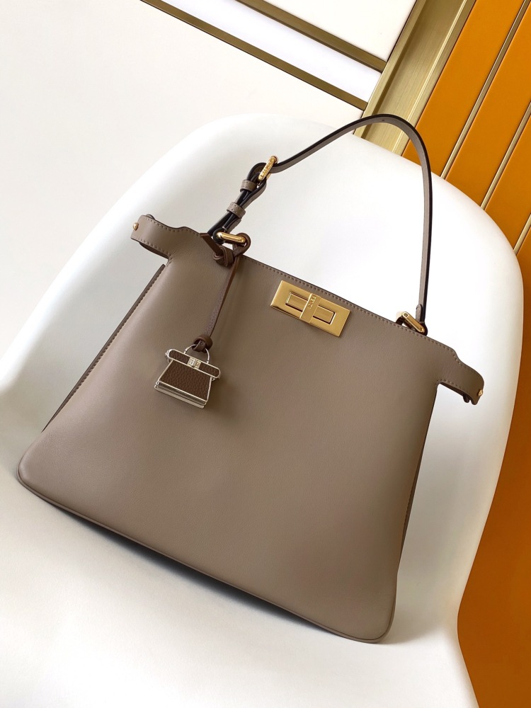 The Fendi Peekaboo medium-sized handbag (elephant grey) is the brand's iconic "little monster" bag.