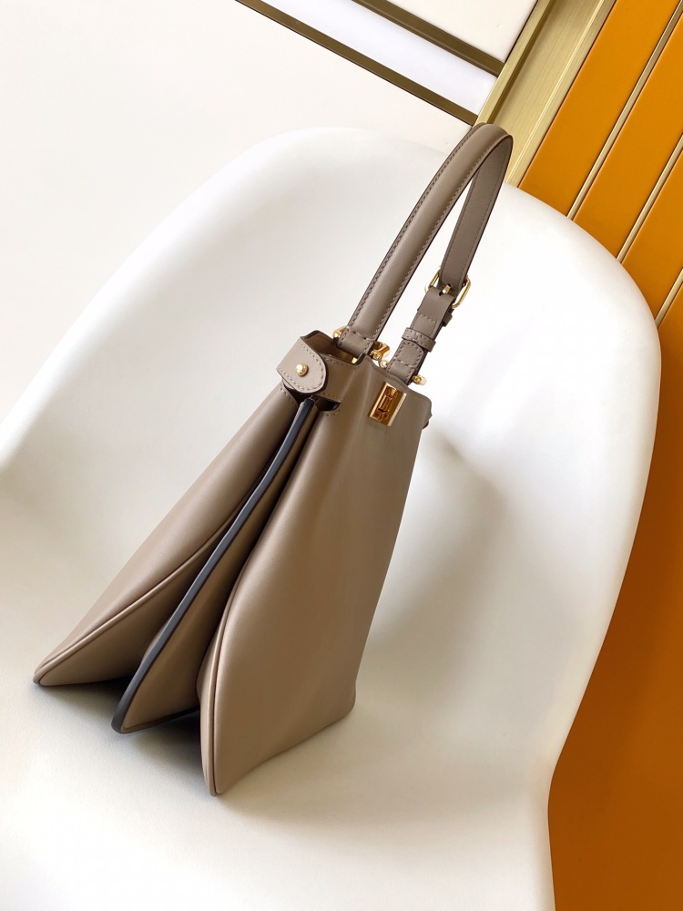 The Fendi Peekaboo medium-sized handbag (elephant grey) is the brand's iconic "little monster" bag.