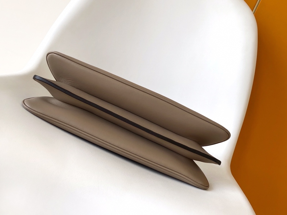 The Fendi Peekaboo medium-sized handbag (elephant grey) is the brand's iconic "little monster" bag.