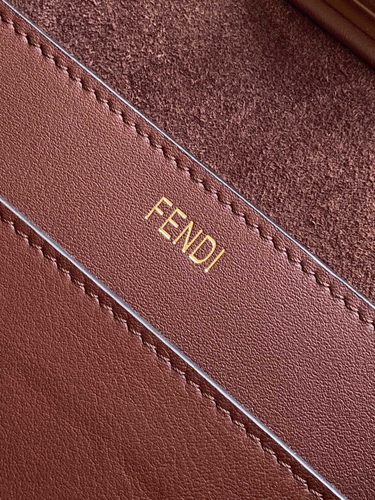 The Fendi Peekaboo medium-sized handbag (chocolate brown/dark brown) is an upgraded version of the brand's iconic "little monster" bag.