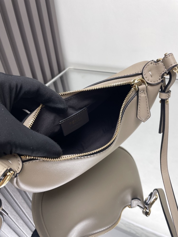 The Fendi Fendigraphy mini hobo shoulder bag (elephant grey) is a popular crescent-shaped bag from the brand in recent years.
