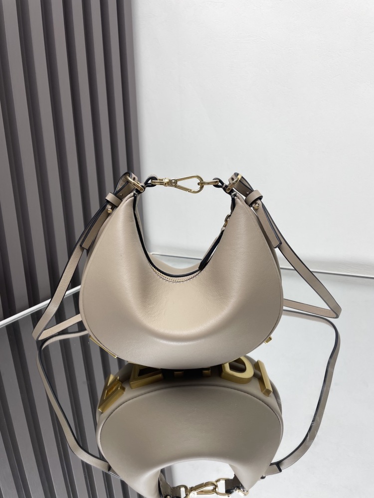 The Fendi Fendigraphy mini hobo shoulder bag (elephant grey) is a popular crescent-shaped bag from the brand in recent years.