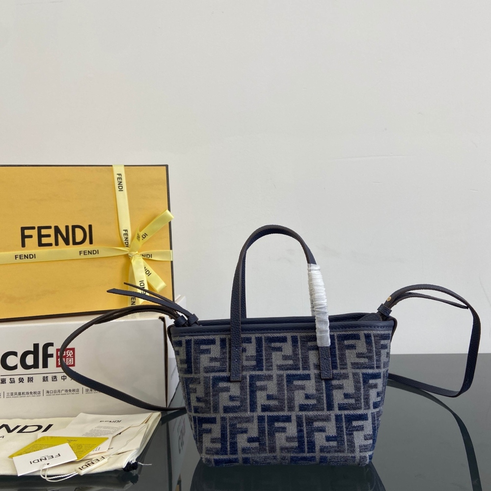 The Fendi Roll mini tote bag (FF denim monogram version) is a super popular "mini bucket" commuter bag from the brand in recent years.